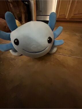 Jellycat Light Blue Axolotl Plush with Dark Blue Smile